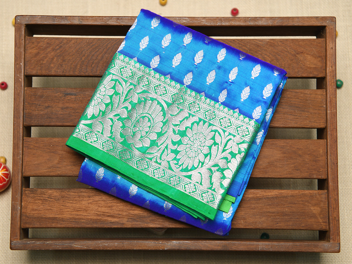 Floral Border With Leaf Buttis Azure Blue Kanchipuram Silk Unstitched Pavadai Sattai Material