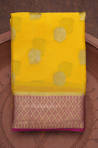 Peacock And Chakram Zari Motifs Mango Yellow Crepe Saree