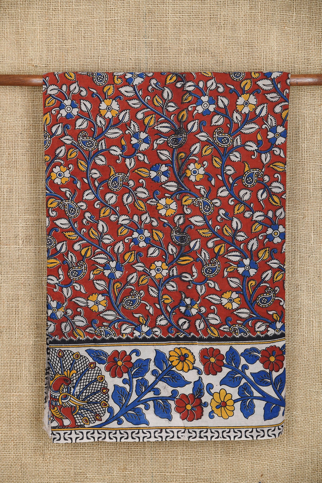 Peacock Border With Allover Floral Design Ochre Red Kalamkari Printed Cotton Saree