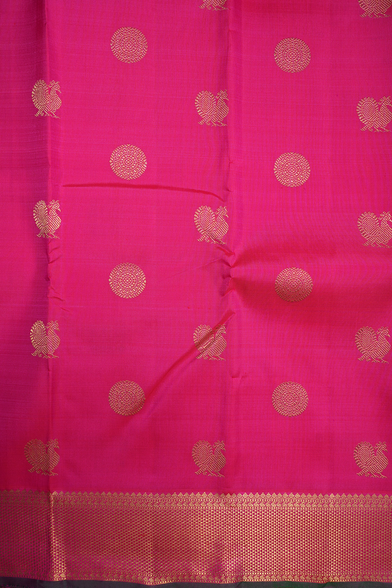 Peacock Chakram Zari Motifs Rani Pink Kanchipuram Silk Saree