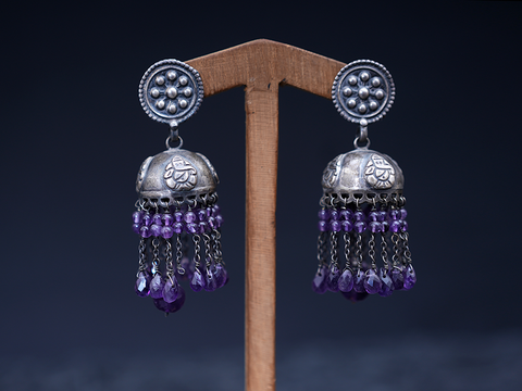 Ganesha Embossed Purple Bead Drop Silver Jhumkas