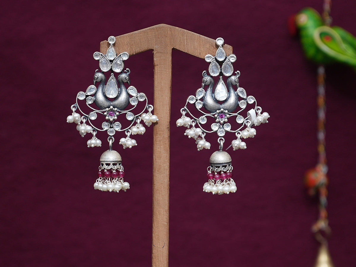Pure Silver With Oxidized Finishing Polki Stone And White Pearl Peacock Design Earrings