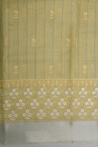 Silver Zari Border With Embroidered Stripes And Floral Butta Soft Yellow Semi Kota Cotton Saree