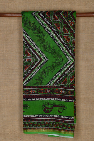 Small Zari Border With Floral And Musical Instrument Printed Green Chanderi Cotton Saree