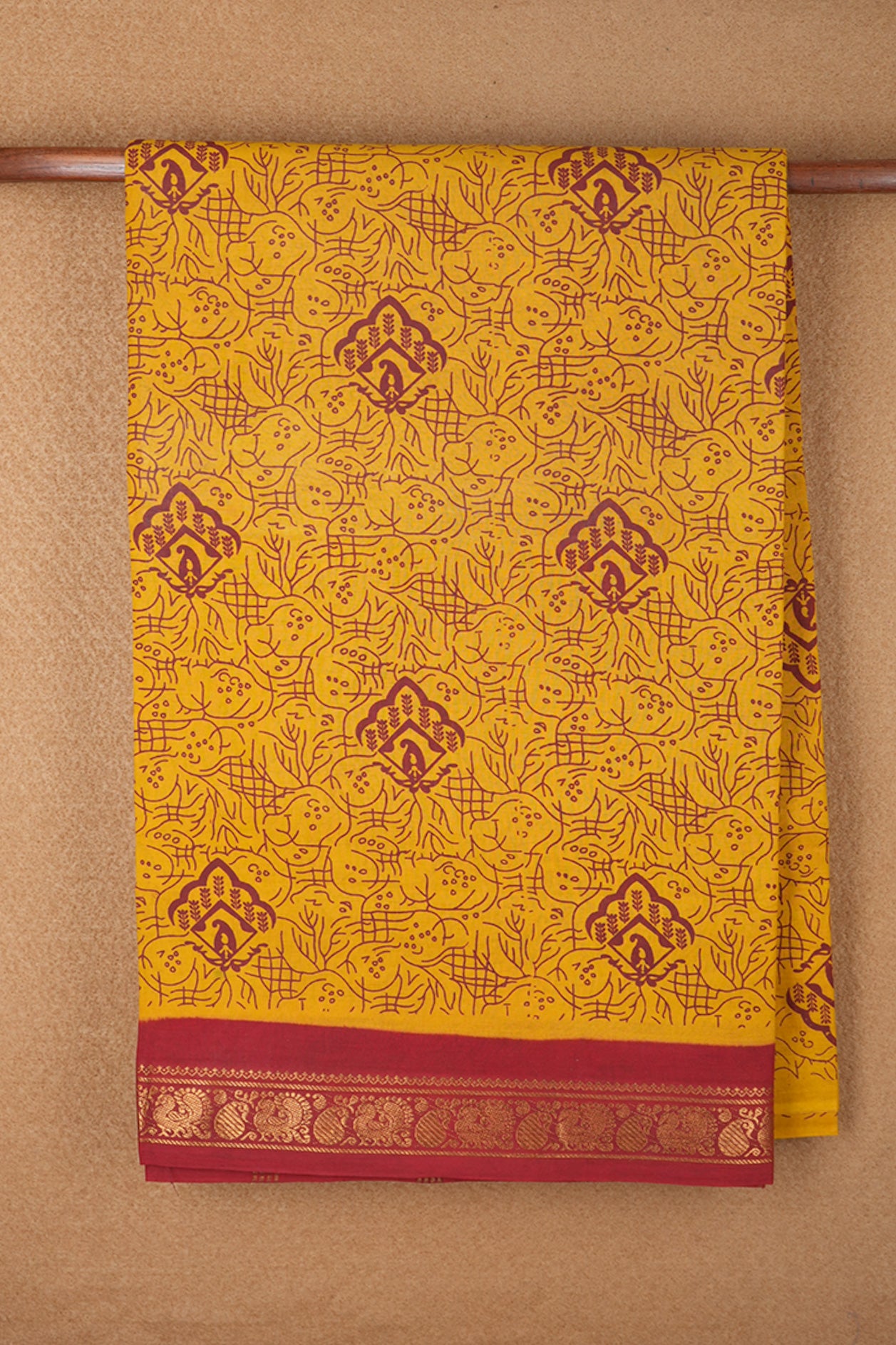 Peacock And Paisley Design Zari Border Marigold Yellow Sungudi Cotton Saree