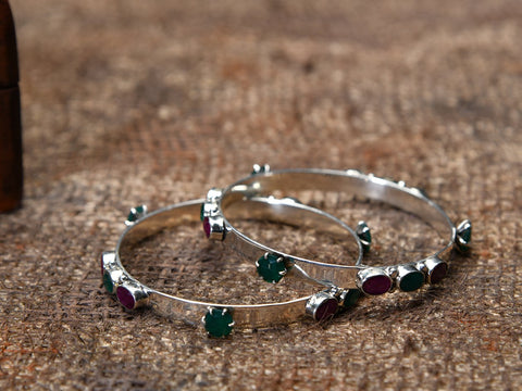 Pair Of Pure Silver Bangles With Semi Precious Green And Red Stones