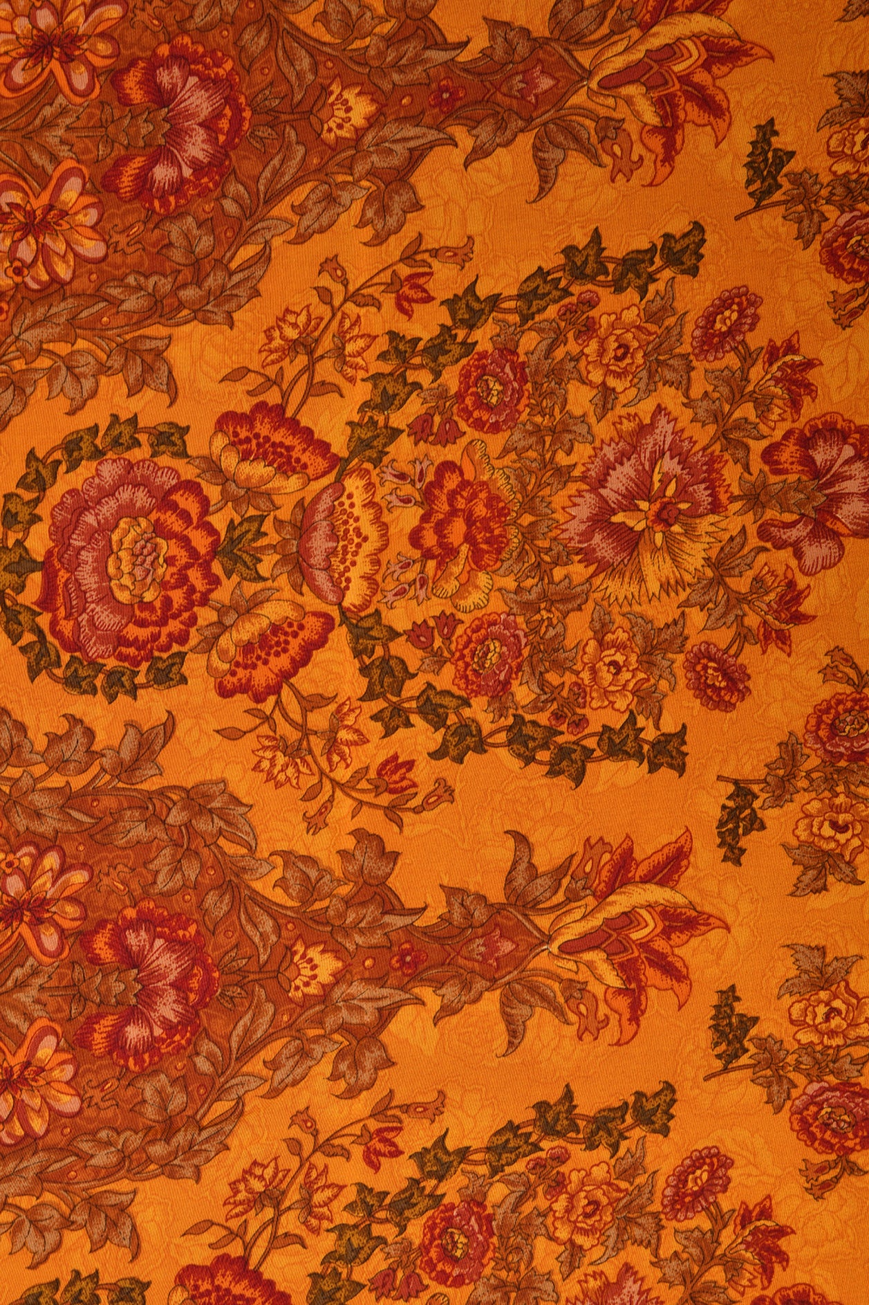 Floral Design Dusty Orange Crepe Silk Saree